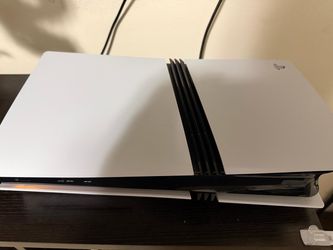 PlayStation 5 pro with disc drive, extra TB memory stick inside and 5 games