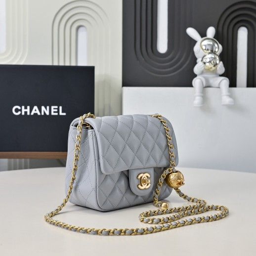 A small cream blue perfume bag