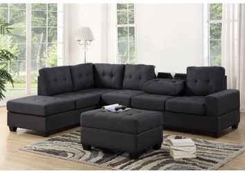 CHARCOAL GREY FABRIC SECTIONAL SOFA WITH OTTOMAN AND CUP HOLDERS NEW