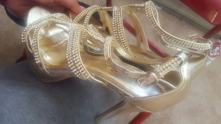 Gold high heels