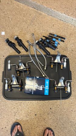 A set of five bath faucets