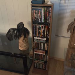 $100 MOVIE STAND WITH MOVIES