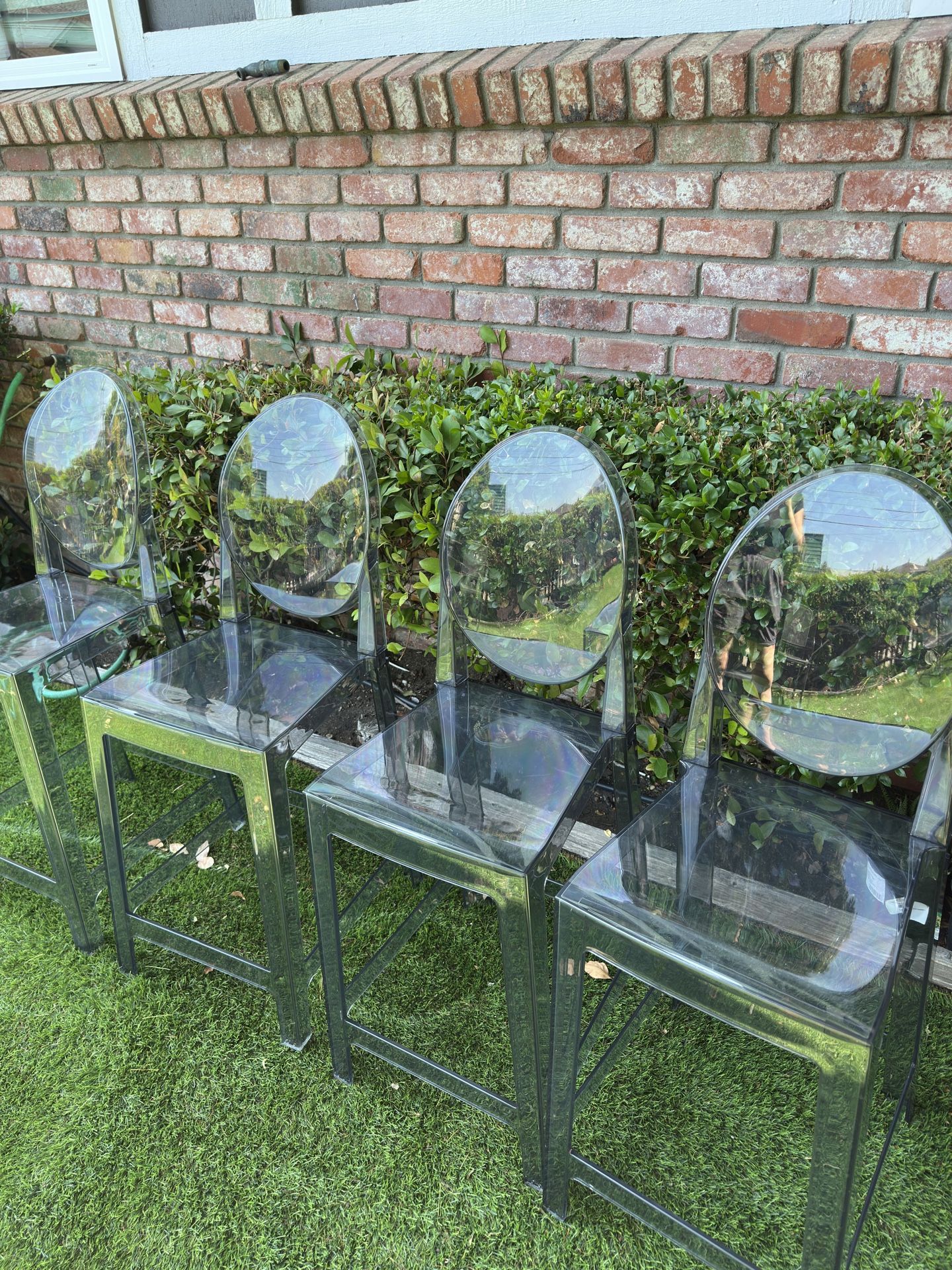 Four Transparent Bar Stools