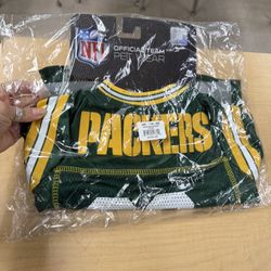 BRAND NEW NEVER OPENED SIZE MEDIUM NFL PACKERS JERSEY FOR DOG