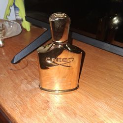 CREED PERFUME EMPTY BOTTLE.  CAN BE RIFFELED  AT MACY 'S