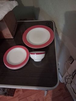 A partial set of milk glass dishes