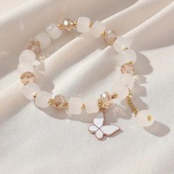 Butterfly Charm Bracelet. Women Bracelet. Hand Jewelry. Gold Tone Bracelet Stretches. White / Ivory Bracelet