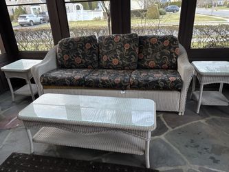 Plastic outdoor white wicker sofa, coffee table , 2 end tables (can sell separately )