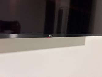 LG Flatscreen TV - 55in