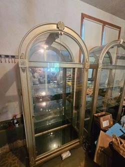 Howard Miller glass cases