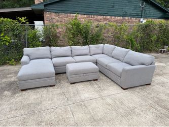 Grey Thomsaville Sectional Couch with Storage Ottoman
