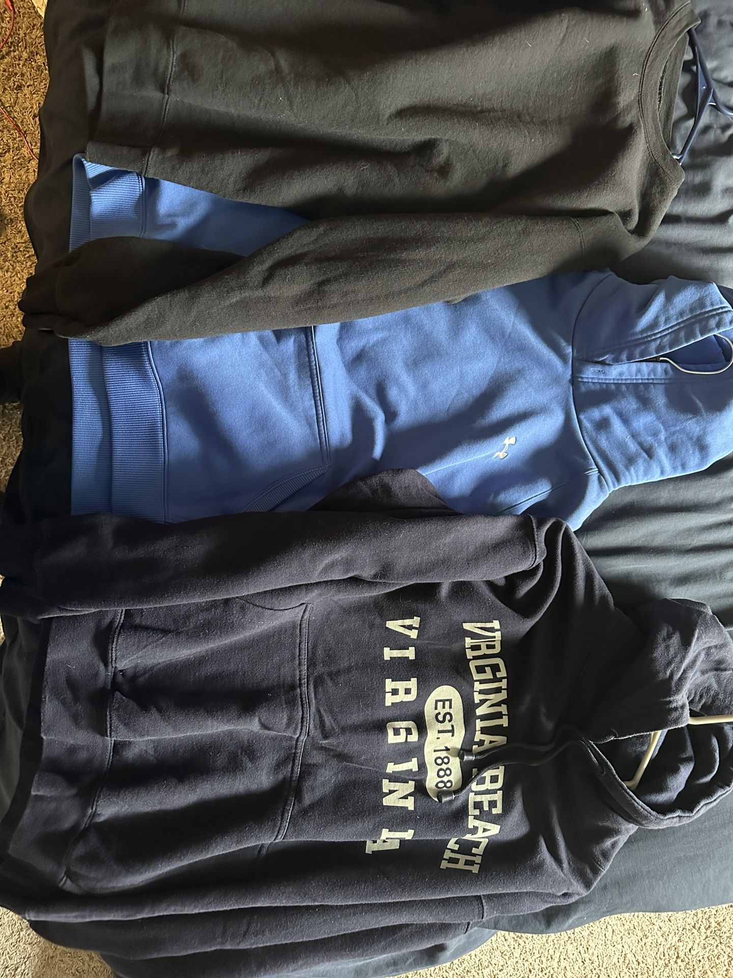 3 Hoodies And A Black Long Sleeve Sweater