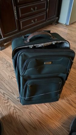 Free 24-inch medium-size suitcase.