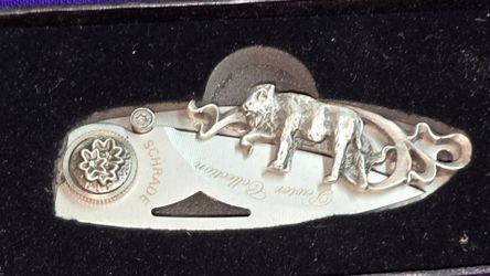 Vintage Collectible Schrade Pewter Collection Buffalo (SCWSBUF) folding pocket knife from the Wildlife Series, presented in its original display box.