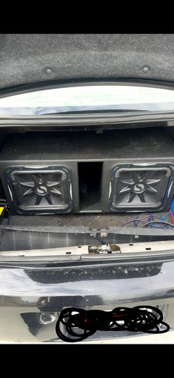 2 kicker solo baric L7 12's in a pro bass box and a JL Audio amplifier