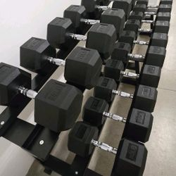 RUBBER HEX DUMBBELLS.
