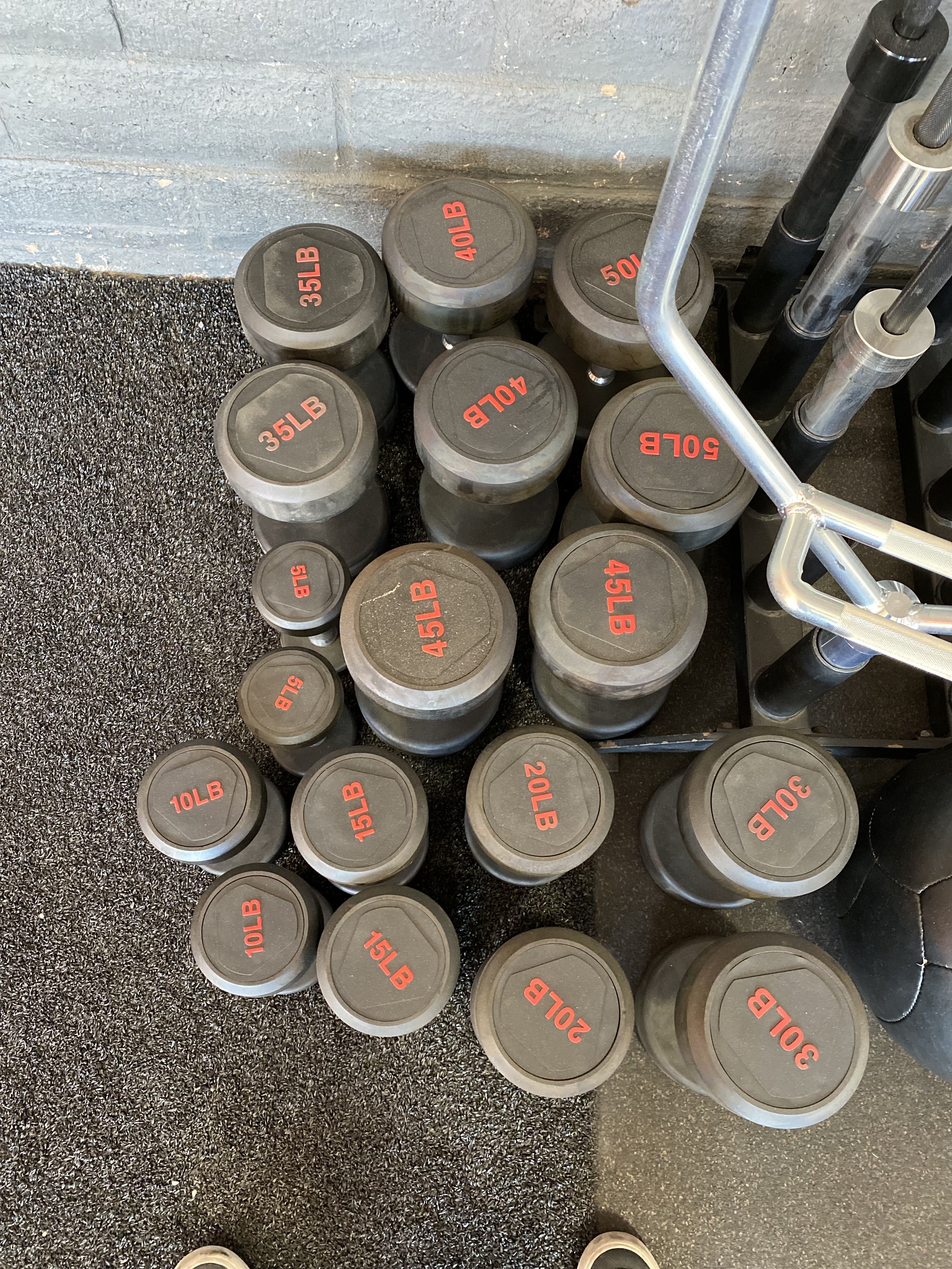 PRO DUMBBELL SETS:Pro Rubber Dumbbell Set- Premium Rubber Dumbbell Set Full set 5-50lb only sold in full set + two their saddle rack