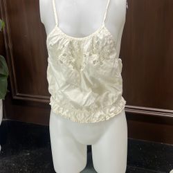 Aerie Halter Top size small  Gently preloved    Elegant cream camisole top with delicate embroidery. Features a ruffled hem and thin straps. 