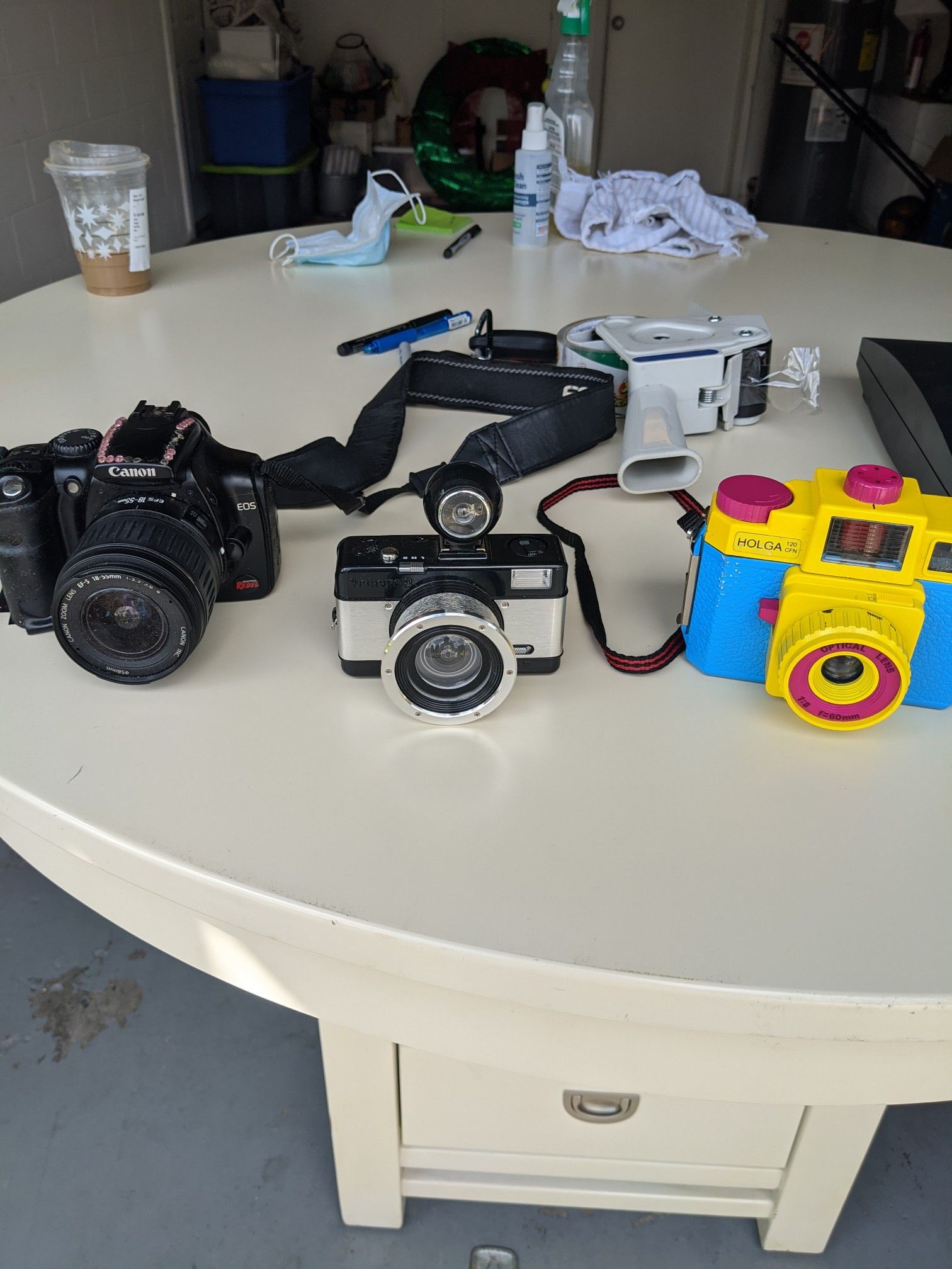 Canon Rebel and Lomography cameras + film $60