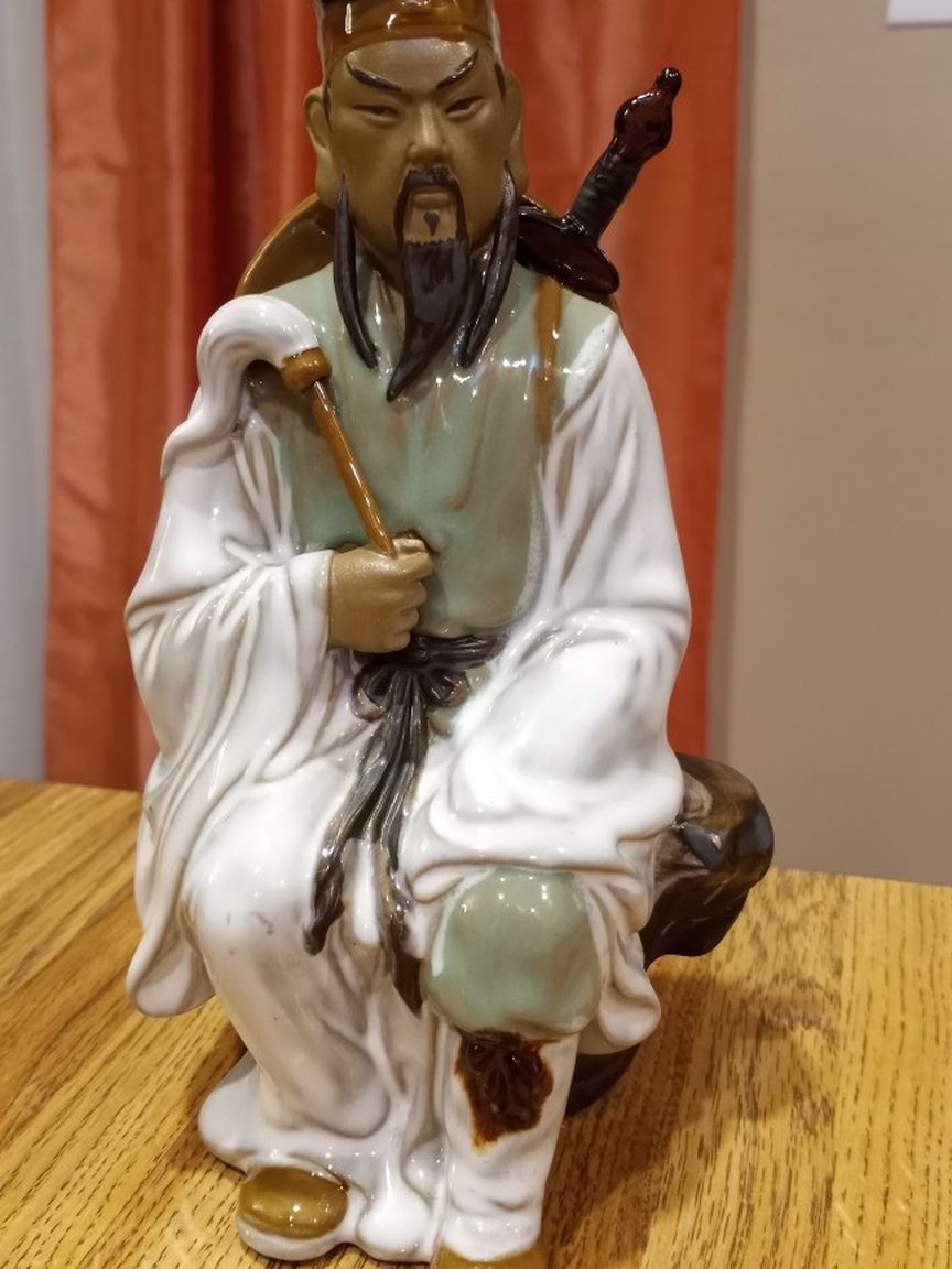Vintage Mudman Dressed In White Sitting On Rock Figurine