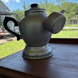 Vintage teapot with strainer