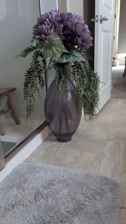 Tall purple vase and faux flowers