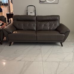 TWO LEATHER SOFAS