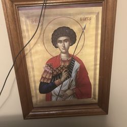icon depicting Saint George.  Saint George is a highly venerated military saint in the Catholic and Orthodox Churches.  He is known as the "Trophy-Bea