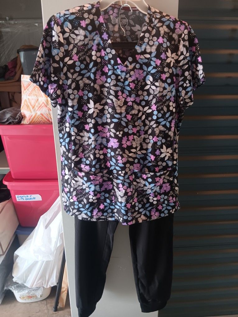 Brand New Scrubs....$10 for top and bottom!!