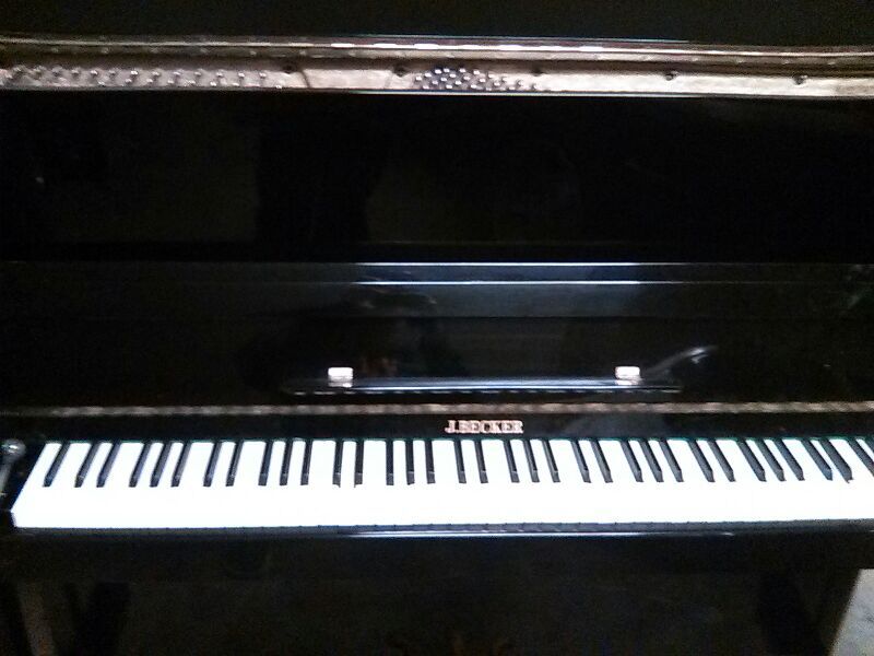 Becker deals upright piano