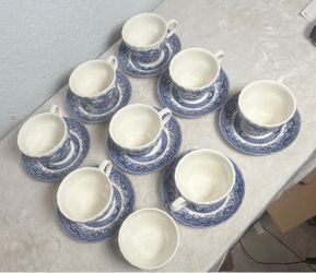 set of 8 cups, 8 saucers, and a sugar bowl