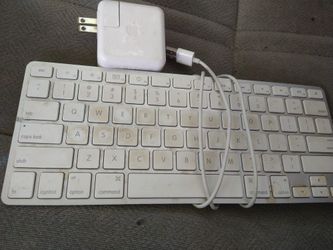 (Untested) Apple Keyboard And Charging Plug 