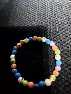 Beautiful Hand Made Clay Bead Braclet. size med