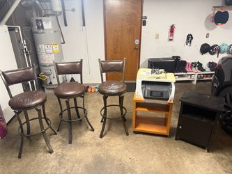 Free three swivel bar stools, one car seat, working printer  and a couple cabinets