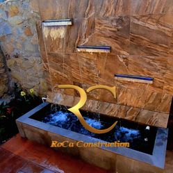 WATER FALLS AND OUTDOOR KITCHENS