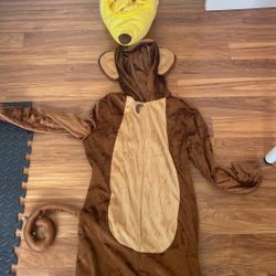 A Monkey Costume With A Banana Head 
