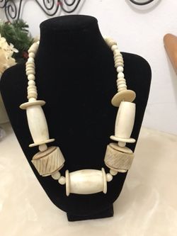 Beautiful necklace I believe it is made of bones