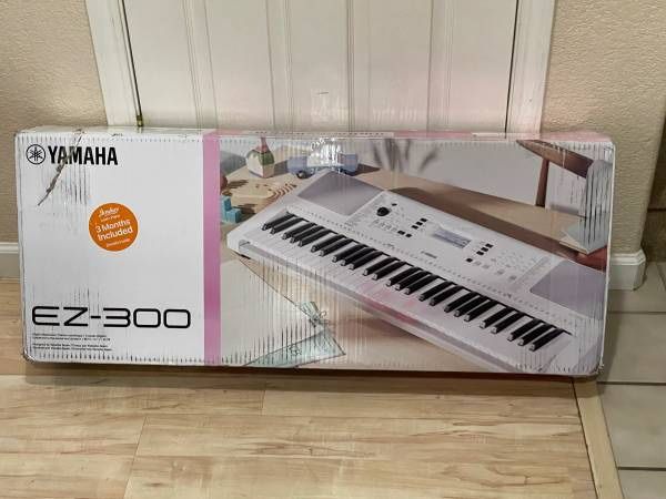 Brand New Yamaha 61 Key Portable Keyboard EZ300 Lighted Keys