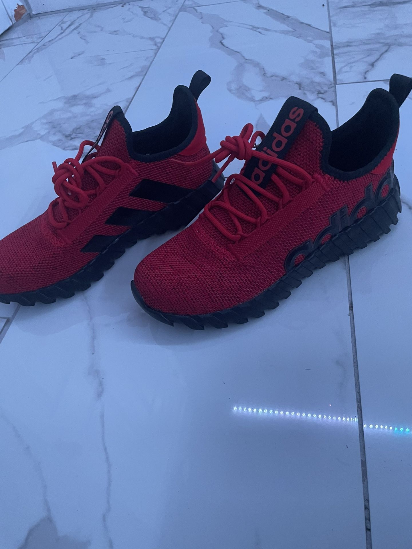 red adidas shoes