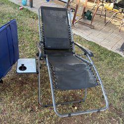 Fold up lounge chair with table