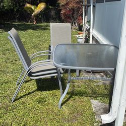 Patio table and 4 chairs