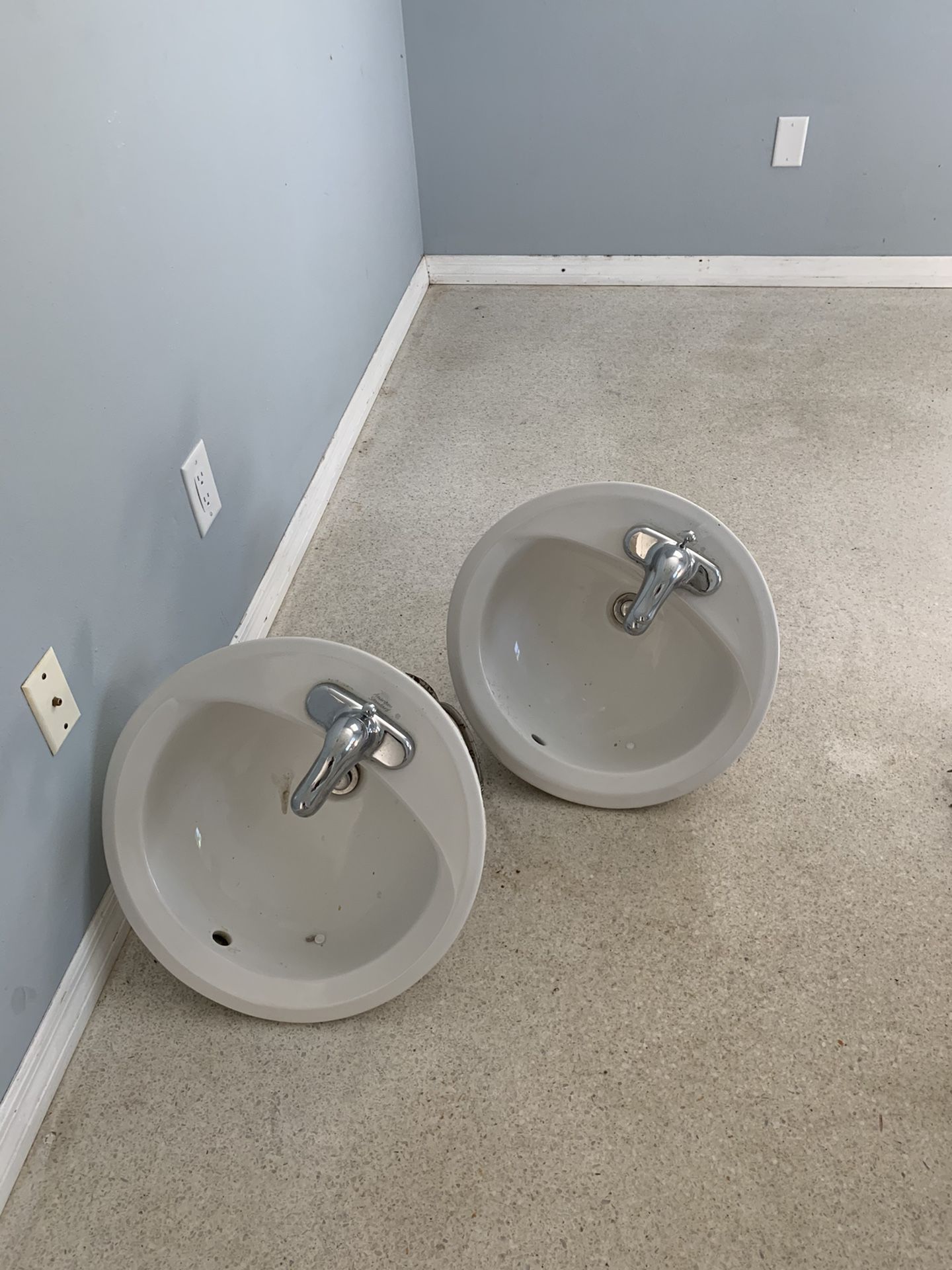 Two vanity sinks with faucets