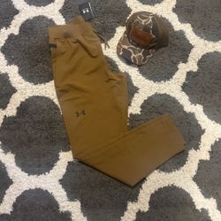 Ua Joggers Size M , Bass Pro Trucker Cap New 