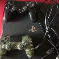 PlayStation 4 Pro(black) With 2 Controllers(1 Black 1 Camo)and All Cords 