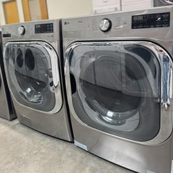 LG Mega Capacity Front Load Washer And Front Load Electric Dryer In Graphnite Steel 