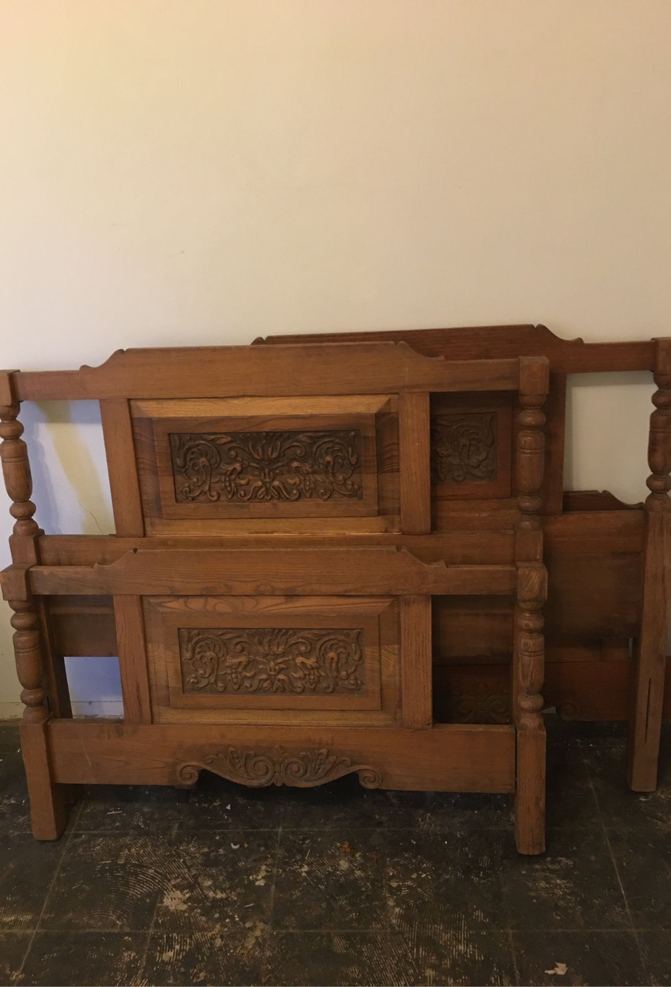 Two antique oak twin bed frames