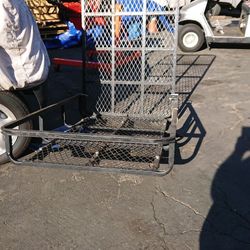 Manual wheel chair rack for rear of car