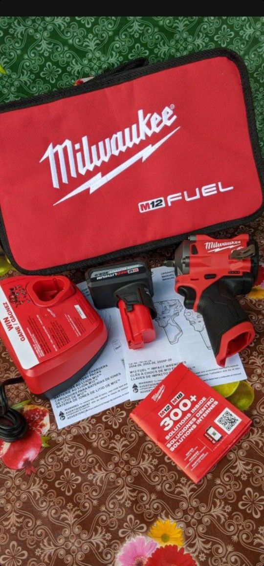 MILWAUKEE M12 FUEL  12-VOLT STUBBY  3/8 IN  IMPACT WRENCH WITH HIGH OUTPUT 5.0AH BATTERY  CHARGER AND SOFT CASE 