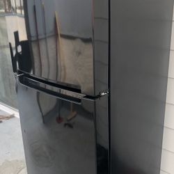 Whirlpool “mini” refrigerator