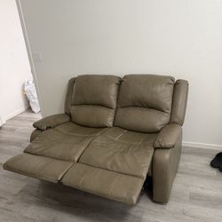 Taupe Leather Reclining Loveseat